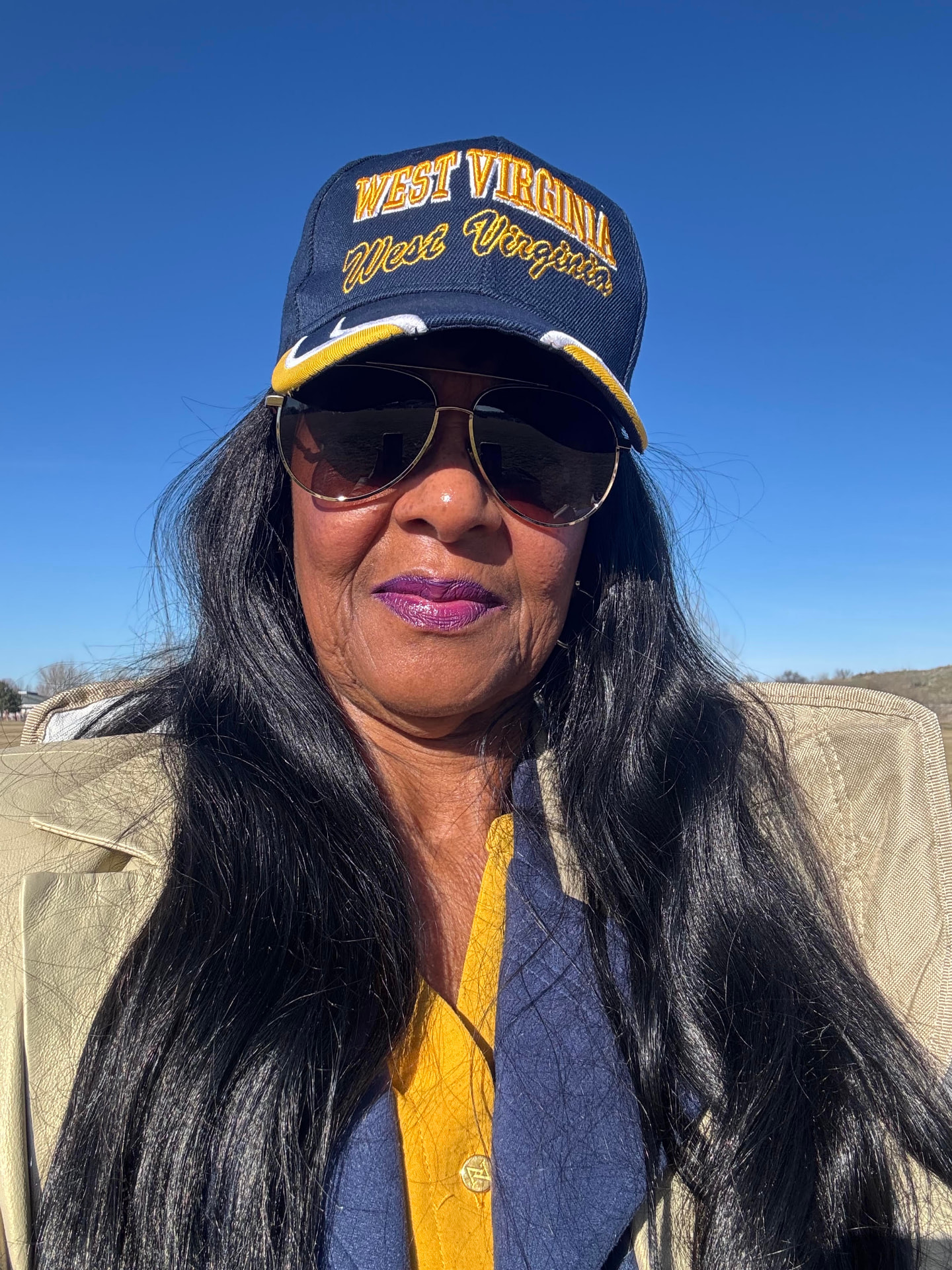 Marva L. Dowdin wearing a West Virginia cap